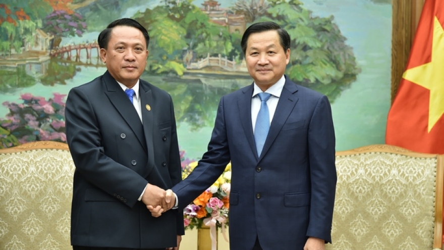 Deputy PM receives Lao Finance Minister in Hanoi